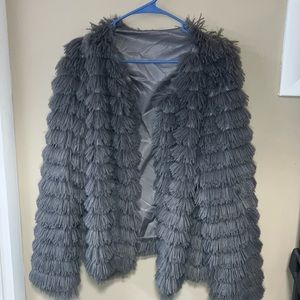 Unbranded. Possibly Avon Lg. Gray shimmer.